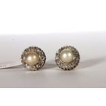 Pearl and Old Cut Diamond stud earrings, central 7mm pearl within a border of old cut diamonds, 12.