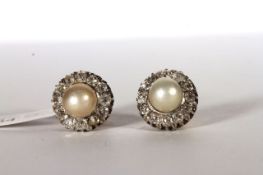 Pearl and Old Cut Diamond stud earrings, central 7mm pearl within a border of old cut diamonds, 12.