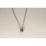 18CT WHITE GOLD EMERALD CUT DIAMOND NECKLACE ESTIMATED AS 0.51CT CENTRE STONE, estimated colour G,