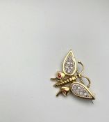 18CT DIAMOND AND RUBY BUTTERFLY BROOCH, dimensions 30x18mms, total weight 8.03gms.