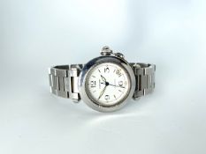 GENTLEMANS CARTIER PASHA MODEL 2324, SN CC558....round, white dial with illuminated sword hands,