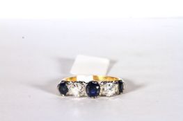 Sapphire and Diamond 5 stone ring, set with 3 sapphires totalling approximately 1.26ct, set with 2