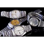 GROUP OF 4 SEIKO 5 WRISTWATCHES, all with day date apertures, one with a white waffle dial, 36-