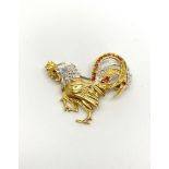 18CT DIAMOND AND RUBY COCKEREL BROOCH, dimensions estimated as 36x30mms , total weight 8.2gms, not