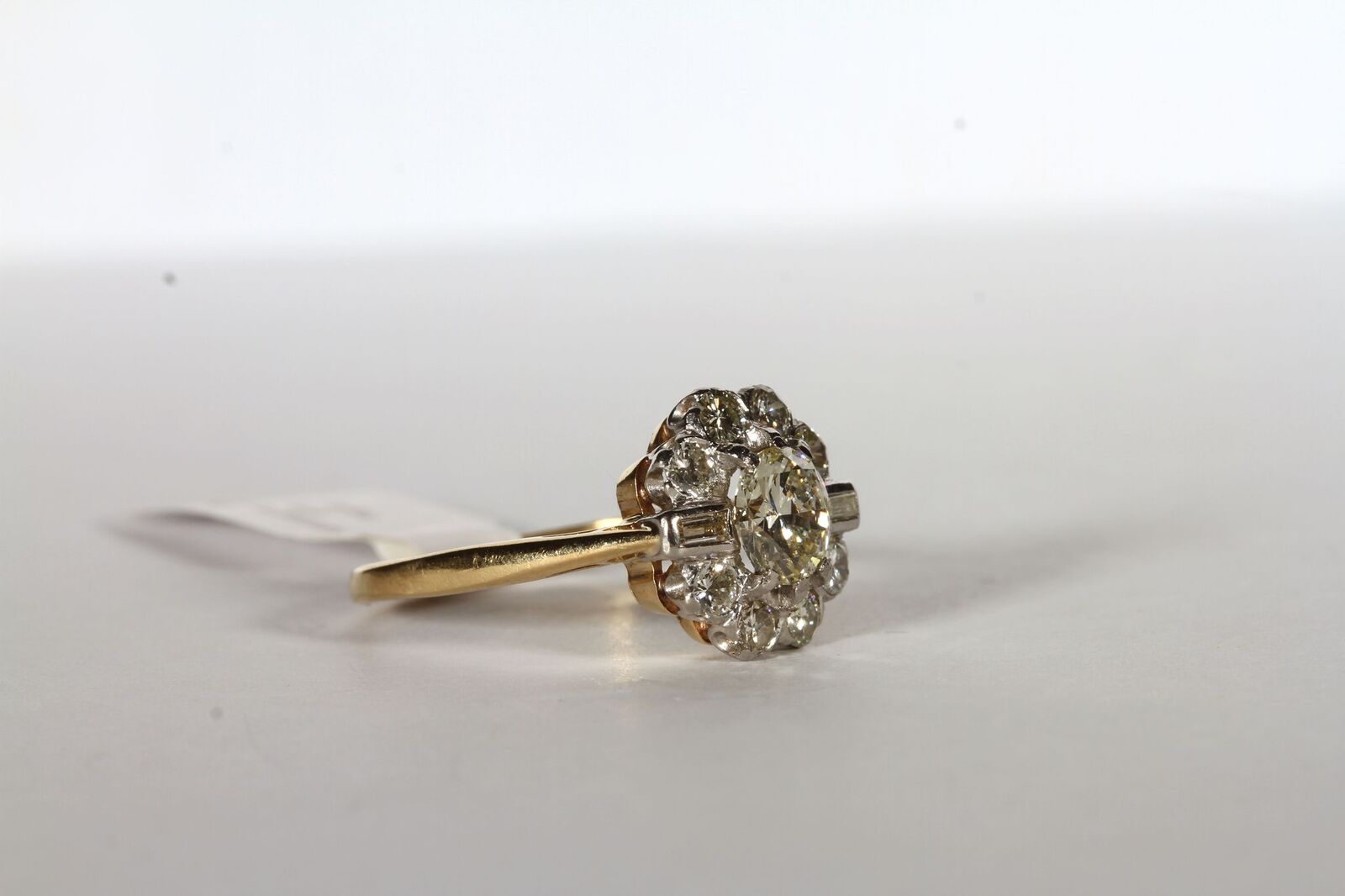 Diamond Cluster Ring, set with a central diamond approximately 0.73ct, surrounded by 2 baguette - Image 2 of 3