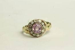 Pink Sapphire and Diamond Ring, set with a centre pink sapphire approximately 1.28ct, surrounded