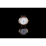 LADIES 9CT GOLD TRENH WRISTWATCH, circular white dial with blue Arabic numerals and a red twelve,