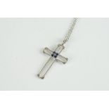 18CT WHITE GOLD SAPPHIRE CROSS MADE BY RANEL,stamped 750 with makers mark, total weight 11.7gms,