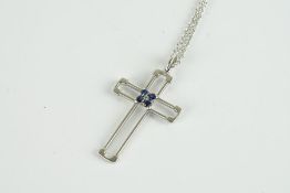 18CT WHITE GOLD SAPPHIRE CROSS MADE BY RANEL,stamped 750 with makers mark, total weight 11.7gms,