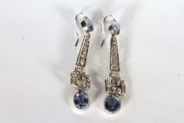 Art Deco Ceylon Sapphire and Diamond drop earrings, a pair of oval cut sapphires to each earring,