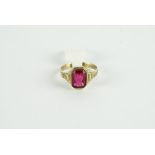 8CT RED PASTE STONE RING,centre stone estimated as 8.4x6.4mm, total weight 2.03gms, has been