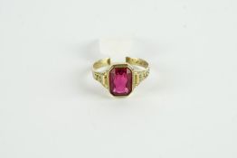 8CT RED PASTE STONE RING,centre stone estimated as 8.4x6.4mm, total weight 2.03gms, has been