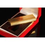 LADIES CARTIER DE MUST LIGHTER , REF 37039 F. 67x 20 mm gold plated case,comes with box and is
