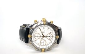 GENTLEMAN'S TWO TONE BREITLING CHRONOMAT MODEL B13047, round,white dial with gold hands, gold