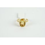 18CT LARGE CITRINE DRESS RING,centre stone estimated as 14x 11 mm,not hallmarked stamped 18ct,