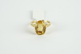 18CT LARGE CITRINE DRESS RING,centre stone estimated as 14x 11 mm,not hallmarked stamped 18ct,