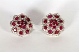 Burmese Ruby and Diamond Earrings, a fantastic pair of of tiered cluster earrings, 14 exceptional