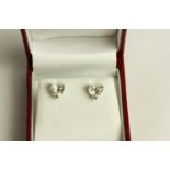 Pair of Heart Shaped Diamond Stud Earrings, set with a total of 2 diamonds