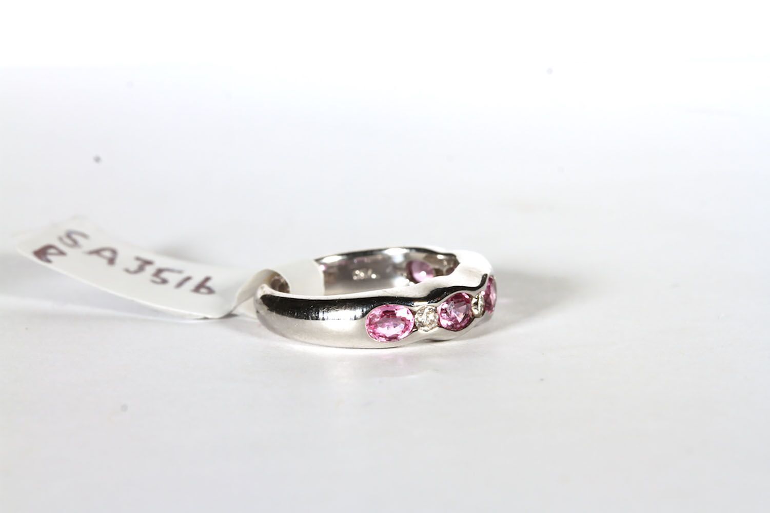 18CT PRAVINS PINK TOURMALINE AND DIAMOND DRESS RING,pink stones estimated as 4x3mm , 4x brilliant - Image 2 of 3