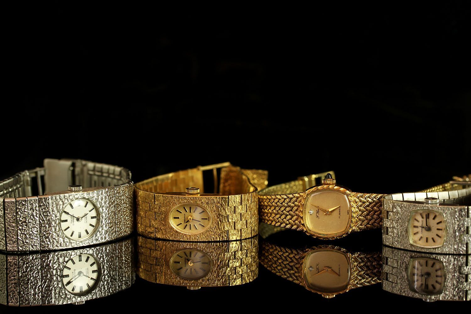 GROUP OF FOUR LADIES WATCHES INCLUDING A CARAVELLE,SWISS EMPRESS, F.HINDS AND WHITE METAL SWISS