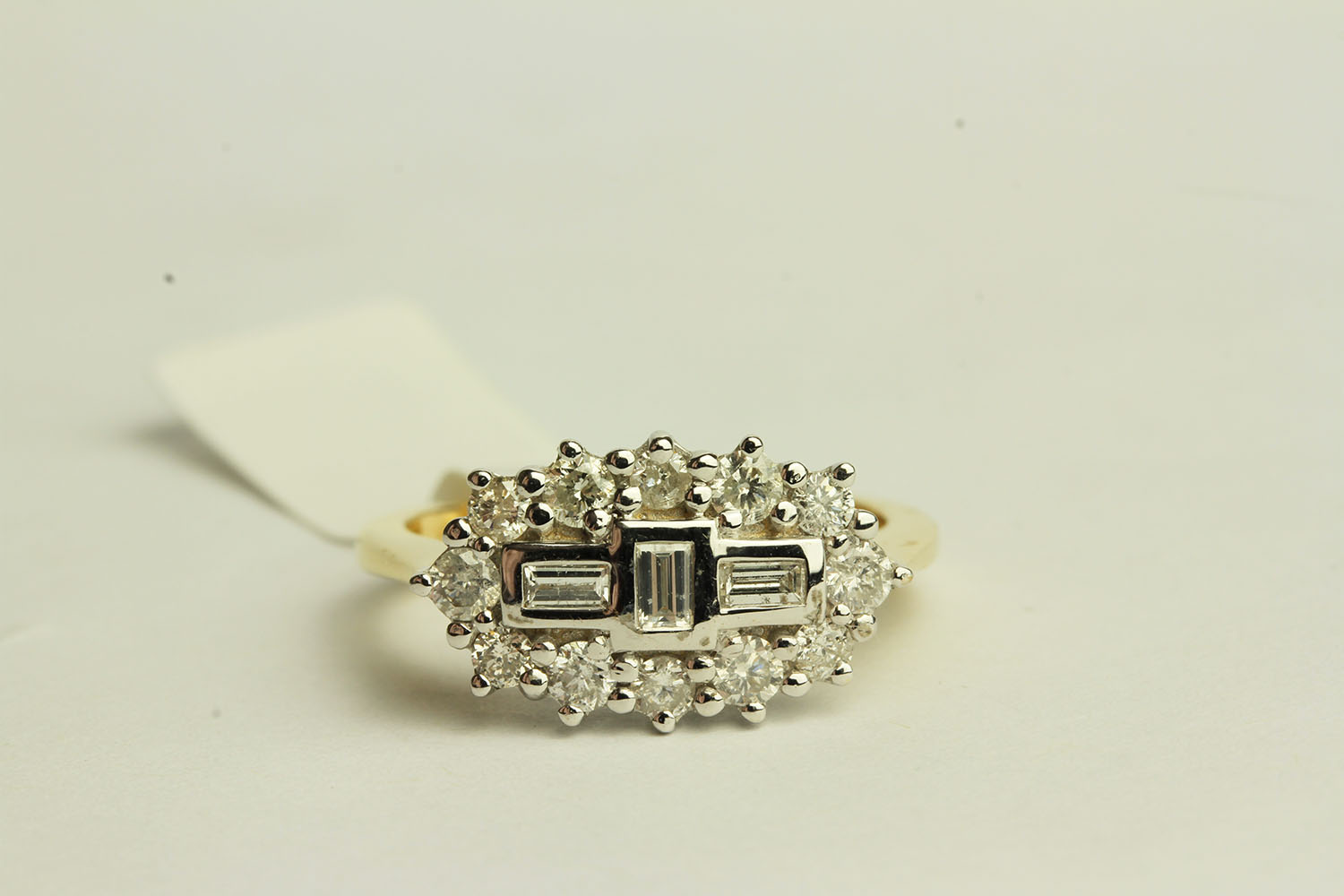 Unusual Diamond Cluster Ring, set with baguette cut and round brilliant diamonds