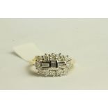 Unusual Diamond Cluster Ring, set with baguette cut and round brilliant diamonds