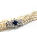 Triple Row Pearl Necklace with Sapphire and Diamond Clasp, three graduating rows of high quality