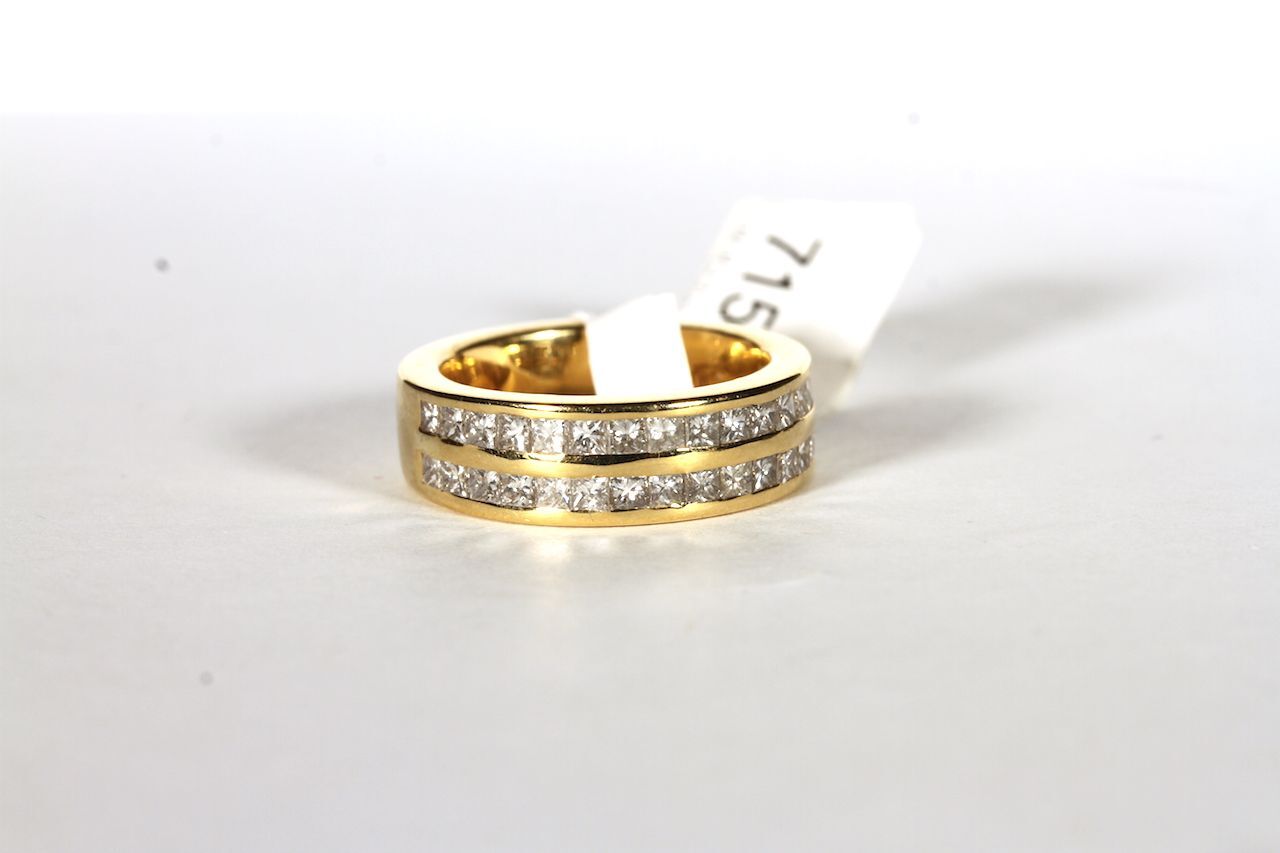 18CT TWO ROW ETERNITY RING,ESTIMATED AS 1.25CT TOTAL, total weight 9.93gs, hallmarked, ring size K