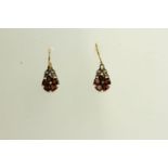 Pair of Garnet and Diamond Flower Design Earrings