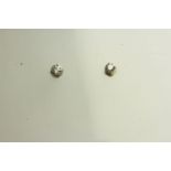 Pair of Diamond Stud Earrings, set with a total of 2 round brilliant cut diamonds