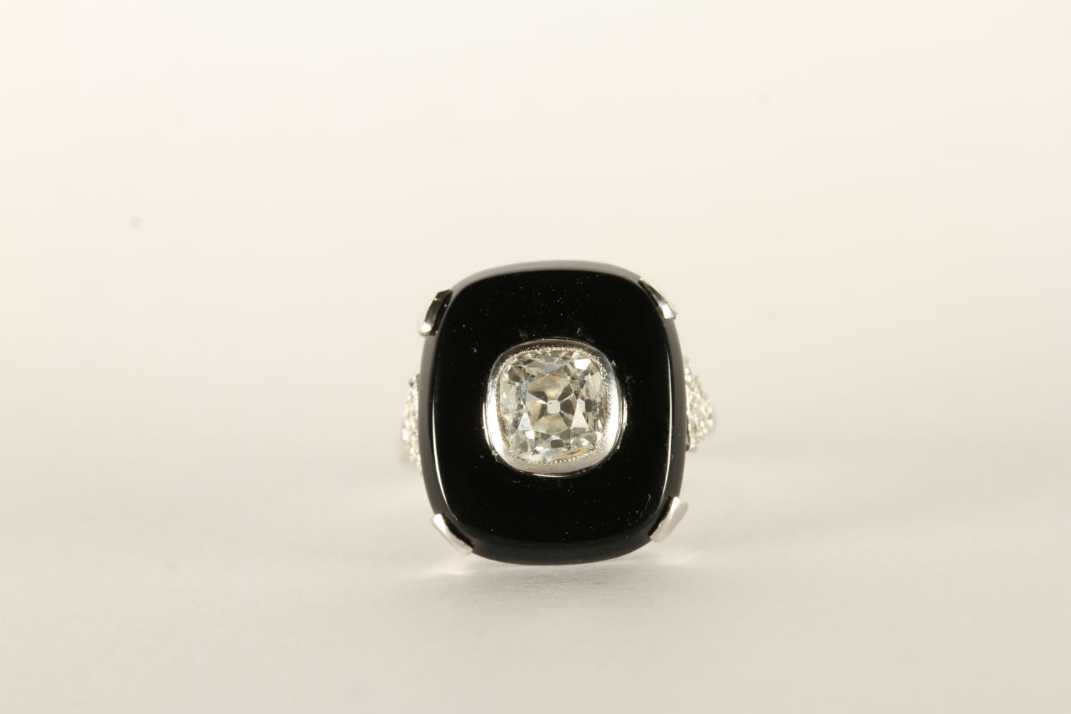 Art Deco Onyx And Diamond Dress Ring, feature cushion cut diamond, estimated weight 1.22ct, set