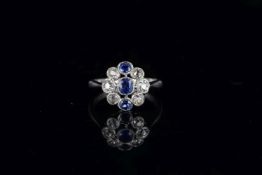 Sapphire and diamond dress ring, three sapphires, with old cut diamonds, estimated diamond weight