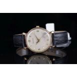 GENTLEMENS JAEGER LECOULTRE OVERSIZE 9CT GOLD WRISTWATCH, circular patina dial with gold hour