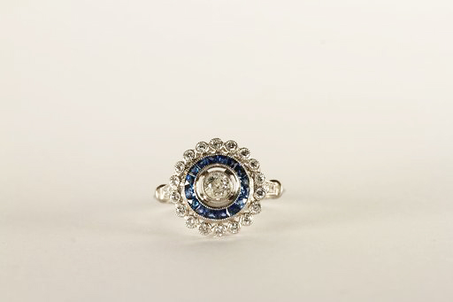 Edwardian Style Sapphire and Diamond Cluster Ring, central old cut diamond approximately 0.30ct,