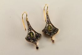 Pair of Amethyst and Peridot Flared Drop Earrings, set with a total of 2 oval cut peridots, set with