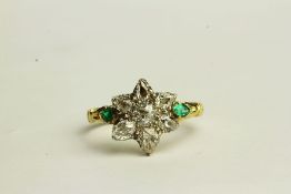 Emerald and Diamond Flower Style Ring, set with 7 diamonds and 2 emeralds, yellow metal not