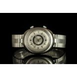 GENTLEMANS JAEGER LE COULTRE MEMOVOX, circular silver dial with luminous hands, block baton markers,