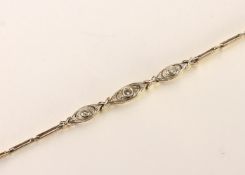 Art Deco Diamond Bracelet, three panels each set with a feature round cut diamond, bright cut with