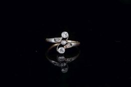 Early 20th Century Diamond Dress RIng, three feature diamonds, twist design mount, tested as 18ct,