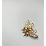 18CT DIAMOND AND RUBY BUTTERFLY BROOCH, dimensions 30x18mms, total weight 8.03gms.