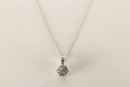 Diamond Set Flower Necklace, set with round brilliant cut diamonds, claw set, set with 1 baguette