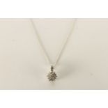 Diamond Set Flower Necklace, set with round brilliant cut diamonds, claw set, set with 1 baguette