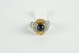 18CT TWO TONE CABOCHON SAPPHIRE AND DIAMOND RING, centre stones estimated as 6.5 mm, diamonds