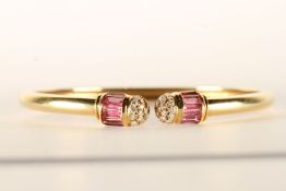 David Morris Pink Sapphire and Diamond Bangle, set with baguette cut pink sapphires and round