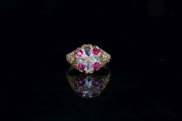 Antique Ruby and Diamond Dress Ring, four pear rose cut diamonds, cornered by four round cut rubies,