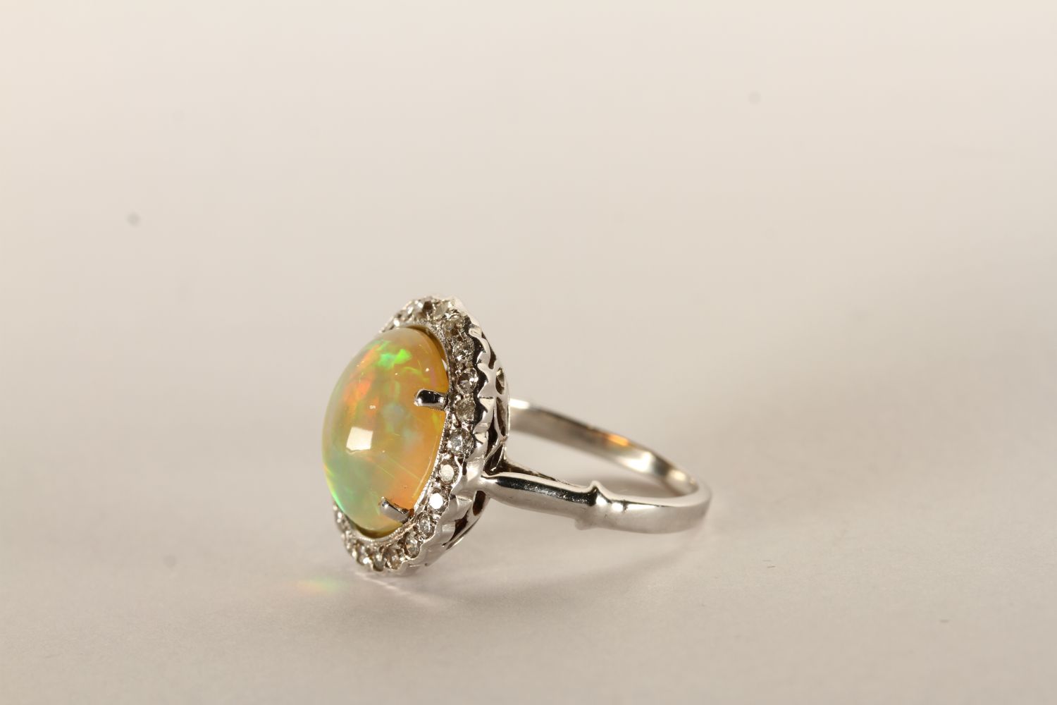 Opal and Diamond Cluster Ring, Cabochon Opal, 12.5x10mm, diamond surround, in 18ct white gold - Image 2 of 3