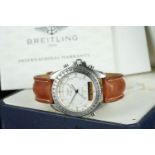 GENTLEMENS BREITLING NEW PLUTON WRISTWATCH W/ BOX & PAPERS REF. A51037, circular silver dial with
