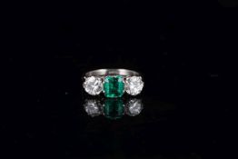 Colombian Emerald And Diamond Ring, central octagonal cut Emerald, estimated 0.91ct, accompanied