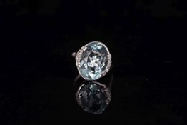 Aquamarine ring, feature 8.54ct Aquamarine, mounted with diamond detail, scroll gallery mount, in