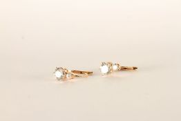 Diamond Earrings, a pair of double diamond earrings, an old cut diamond with a smaller diamond